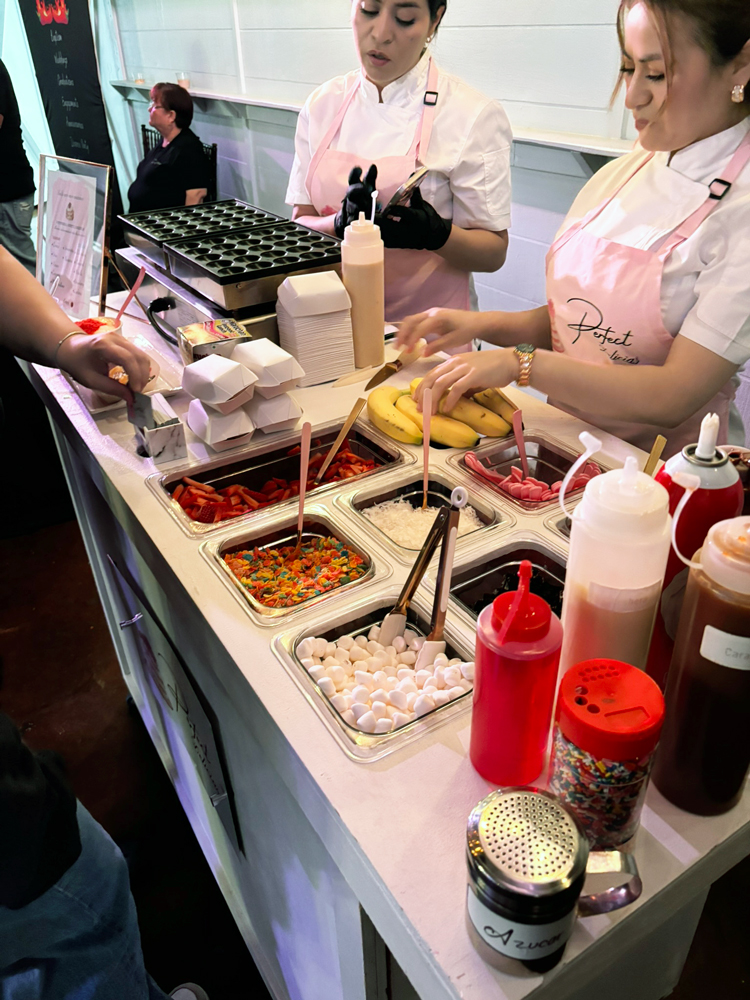 Vendor service cart used for freshly made pancakes and beverage service at a quinceanera reception